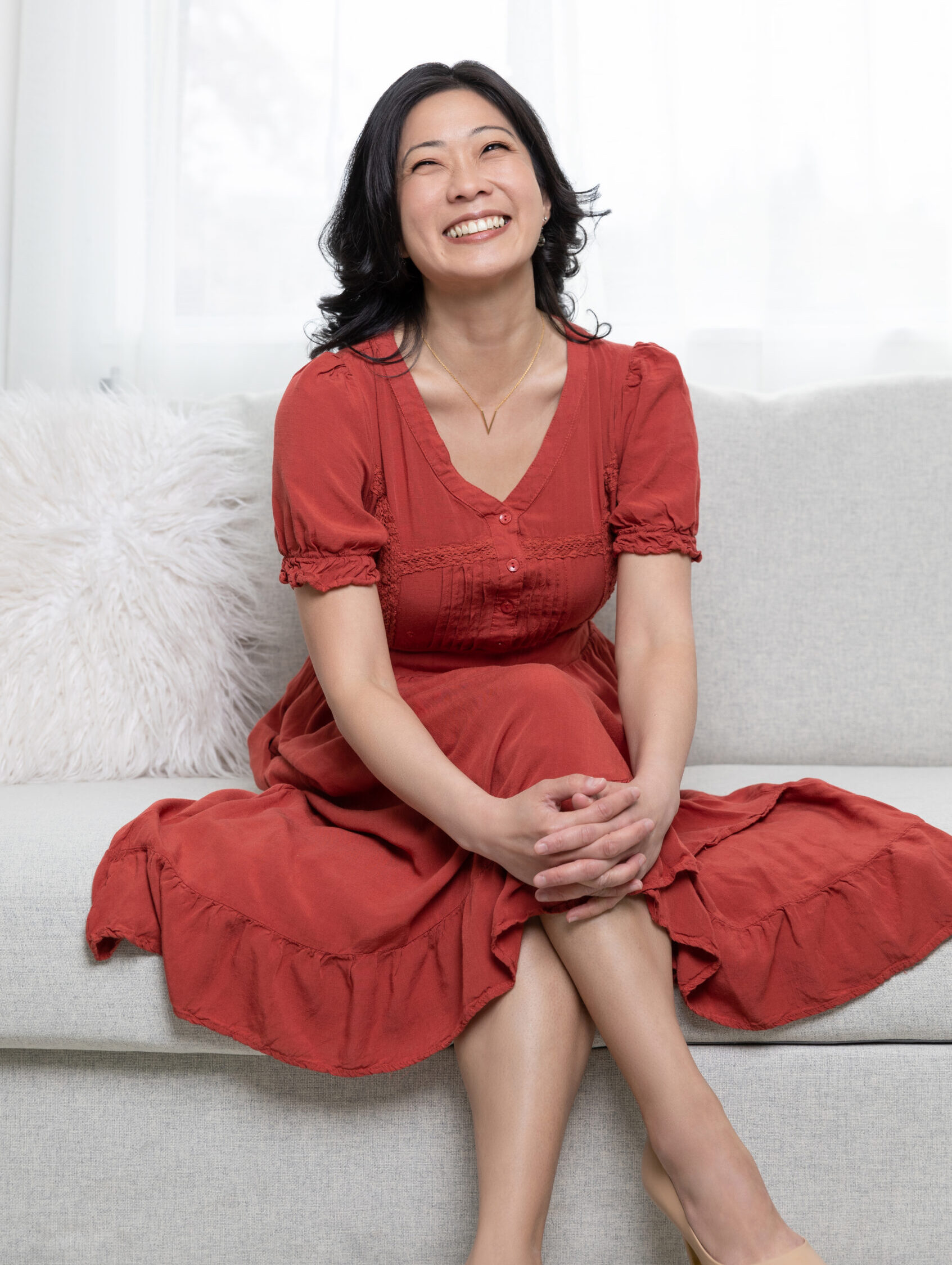 Becky Lee, founder of AskBecky, smiling confidently in a professional setting, representing Fractional COO services and expert business operations support.